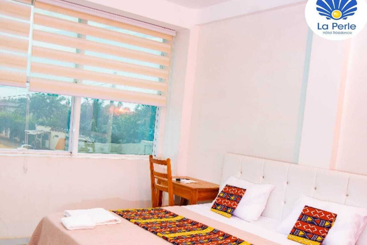 Premium bedding, memory-foam beds, minibar, desk