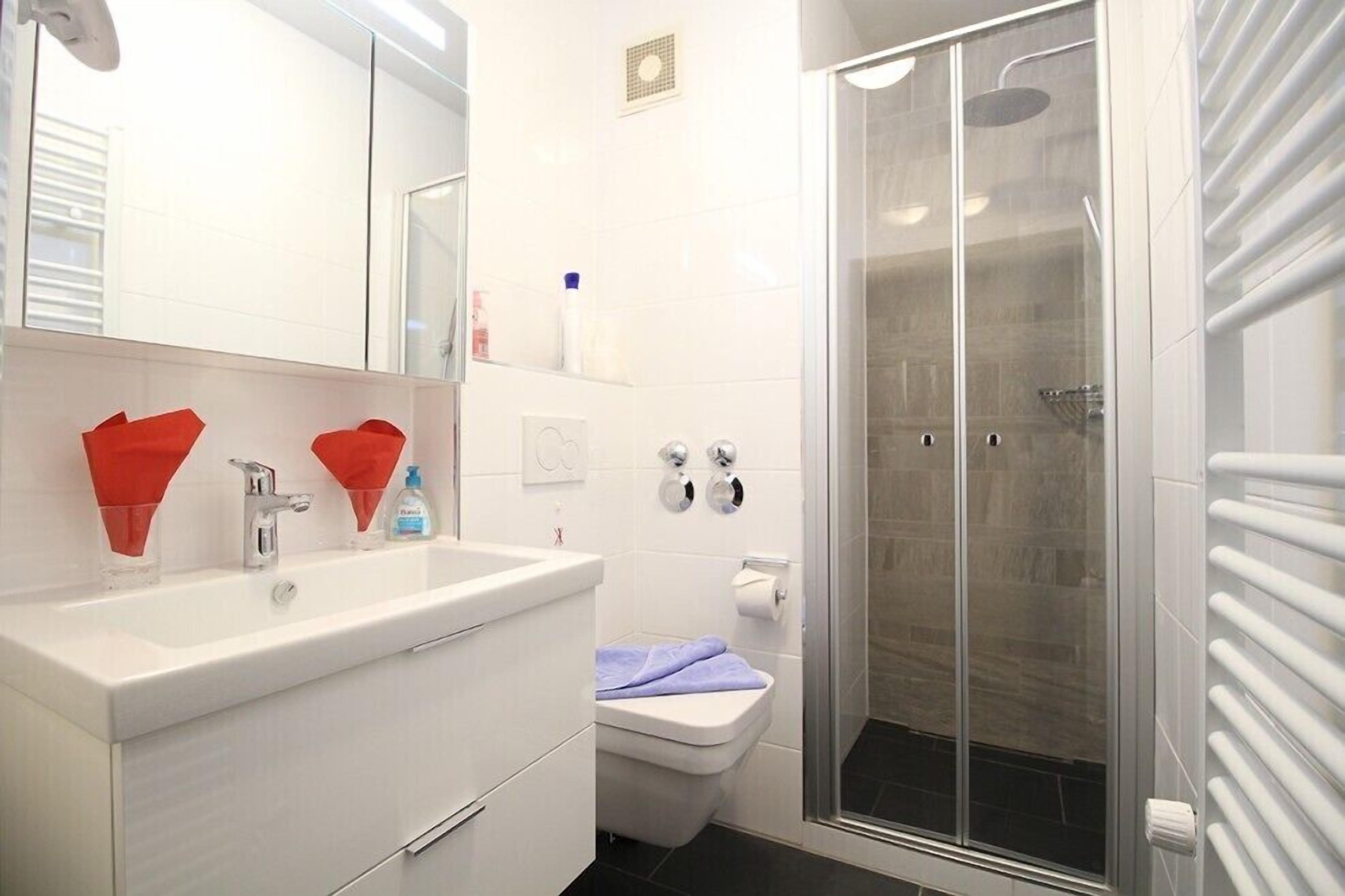 Apartment, 1 Bedroom, Balcony (Wank) | Bathroom | Shower, hair dryer, towels, toilet paper