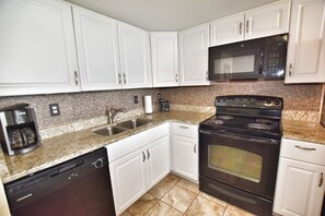 Condo, 2 Bedrooms | Private kitchen | Fridge, oven, coffee/tea maker, toaster