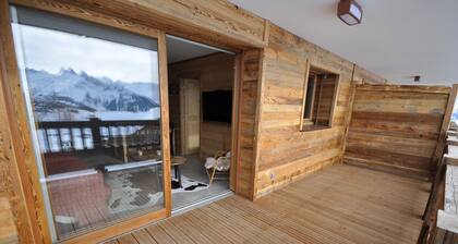 Appartement neuf et chaleureux avec vue panoramique, accĂšs direct sur les pistes