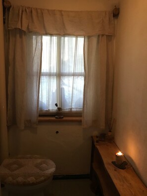 Shower, eco-friendly toiletries, towels, soap