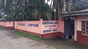 A building with a sign that reads "EGRUSIANA LODGE FULLY AIR-CONDITIONED and BOARDING HOUSE." - EG Rusiana Boarding House (Claver)