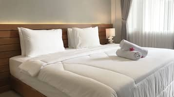 Deluxe Double or Twin Room, Pool View | In-room safe, desk, free WiFi, bed sheets