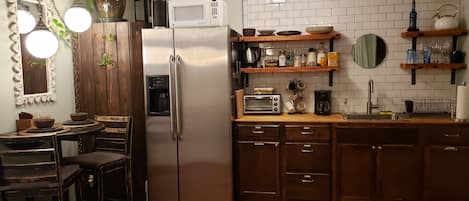 Fridge, microwave, stovetop, coffee/tea maker