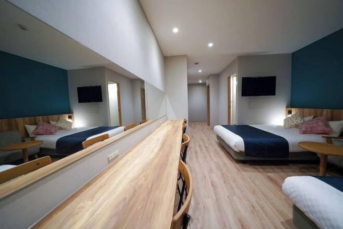 Desk, laptop workspace, WiFi (free), bed sheets