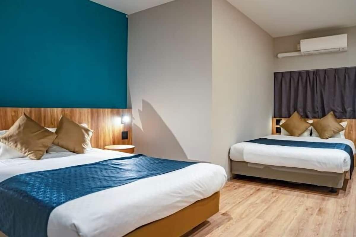 Desk, laptop workspace, WiFi (free), bed sheets