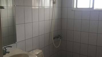 Shower, free toiletries, hair dryer, slippers