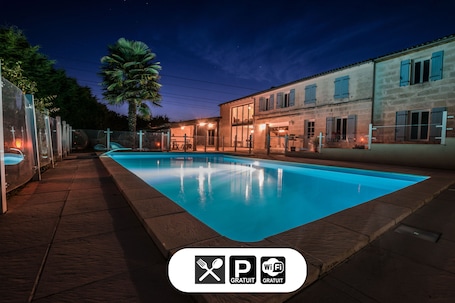 Seasonal outdoor pool, open 11:00 AM to 9:00 PM, pool umbrellas. Les Cuves