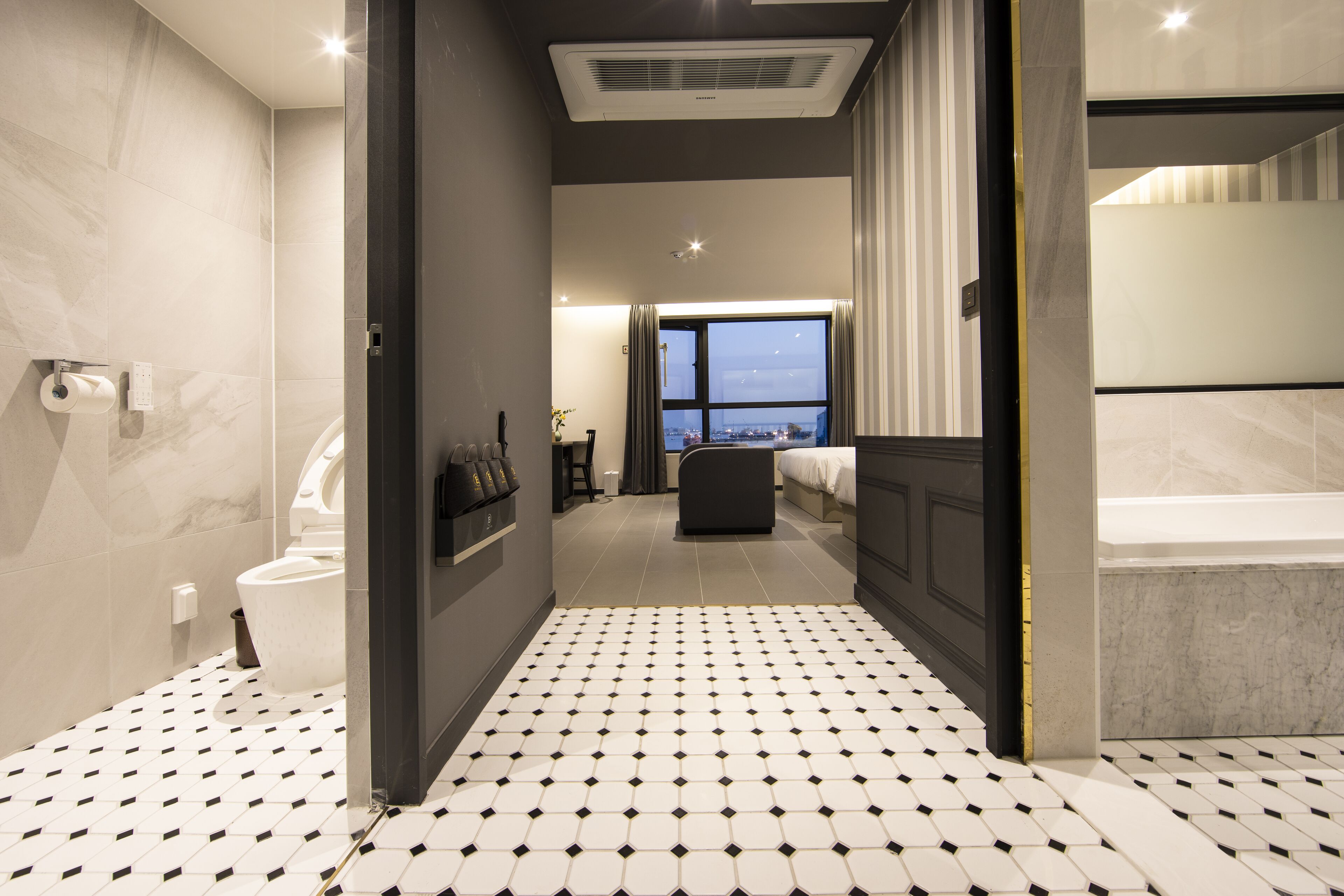 deluxe family twin, ocean view | bathroom | hair dryer, bathrobes, slippers, bidet