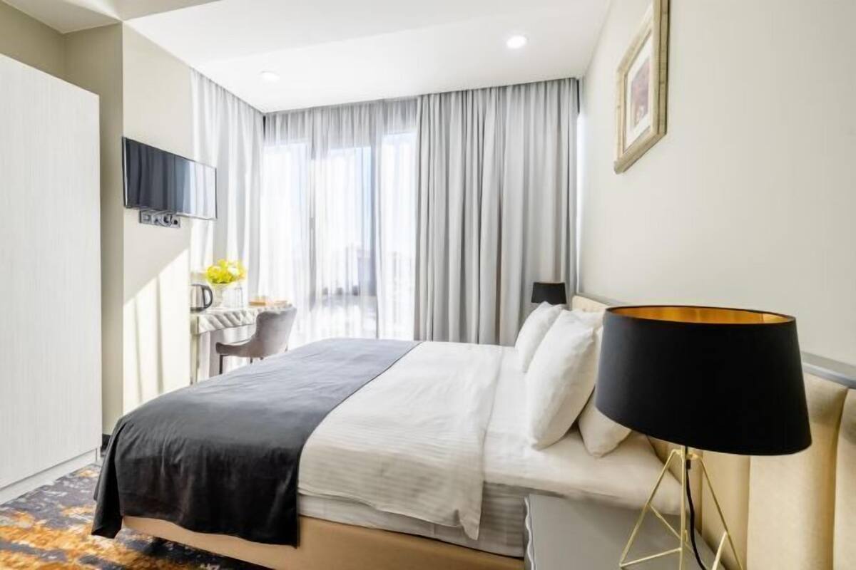 Premium bedding, minibar, desk, laptop workspace