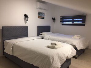 Premium bedding, down duvets, desk, iron/ironing board - F48 Homes (Fethiye)