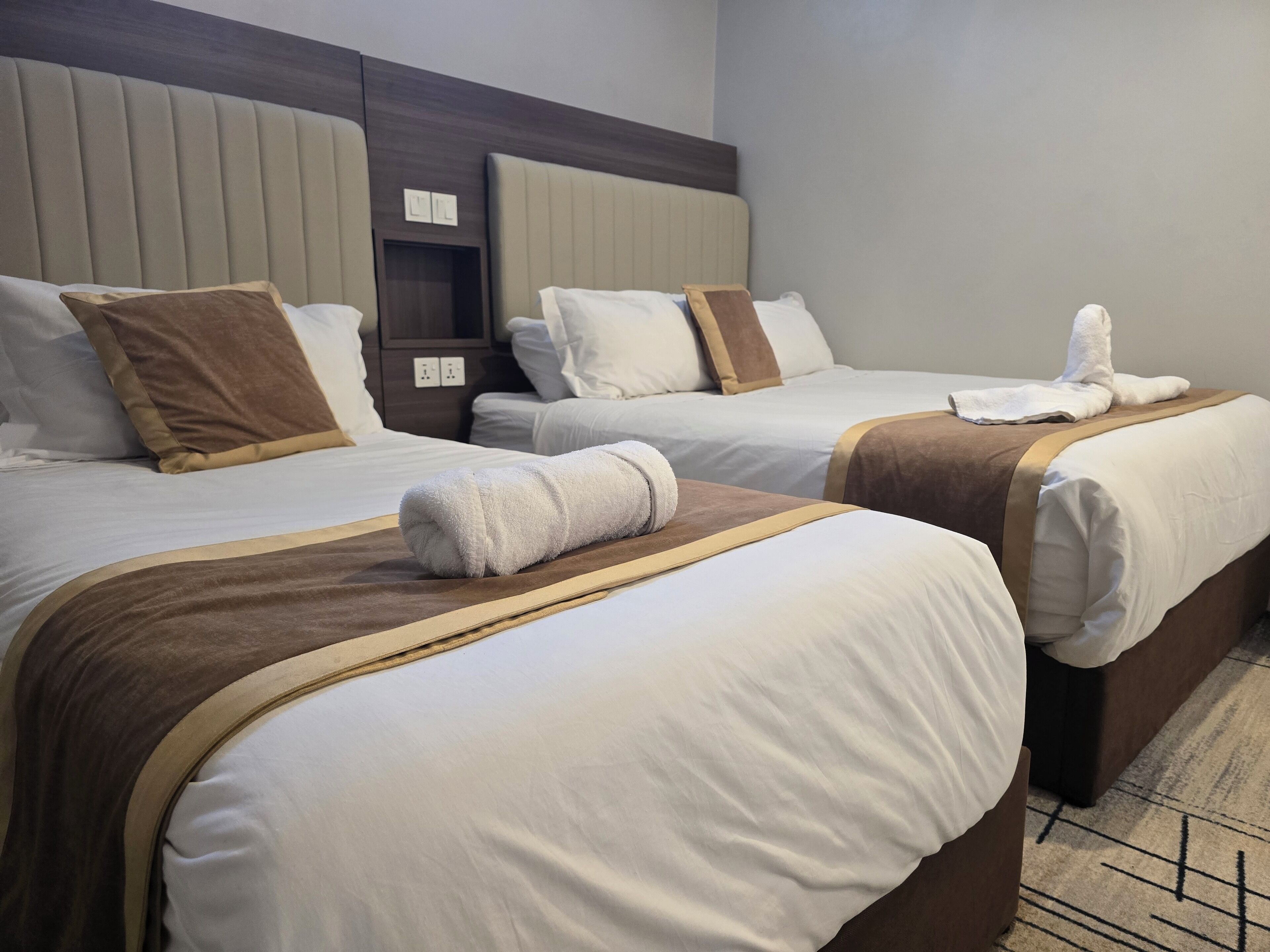Pillow-top beds, desk, free WiFi, bed sheets
