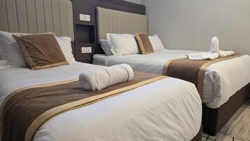 Pillow-top beds, desk, free WiFi, bed sheets