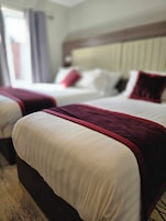 Pillowtop beds, desk, free WiFi, bed sheets