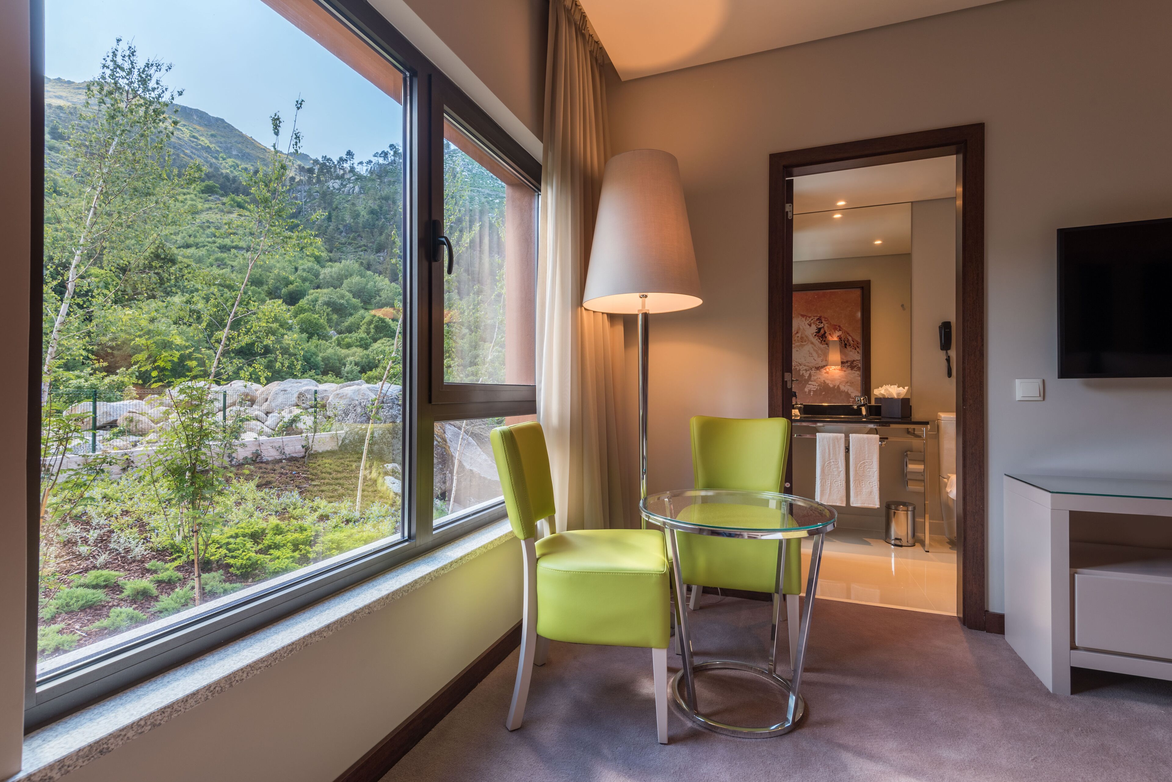 family twin room (2 adults + 2 children) | living area | 15-cm lcd tv with cable channels, tv