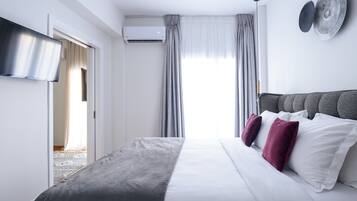 Deluxe Apartment, 2 Bedrooms | 2 bedrooms, in-room safe, desk, blackout curtains