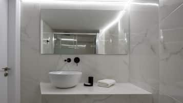 Deluxe Apartment, 2 Bedrooms | Bathroom | Shower, free toiletries, hair dryer, bathrobes