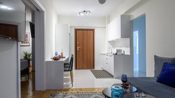 Deluxe Apartment, 2 Bedrooms | Private kitchen | Full-size fridge, microwave, oven, stovetop