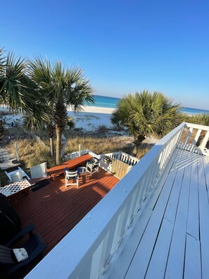 A wooden deck with a view of the beach and ocean. - 30A Sparkling Clean 🦋Salt therapy!Stay on BeachWest , pier park ocean front (Panama City Beach)