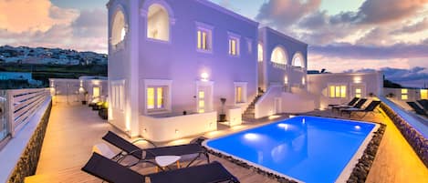 Seasonal outdoor pool, pool umbrellas, pool loungers