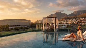 Outdoor pool, pool umbrellas, pool loungers