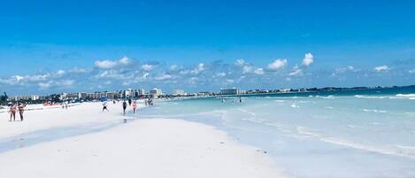 On the beach, sun-loungers, beach towels