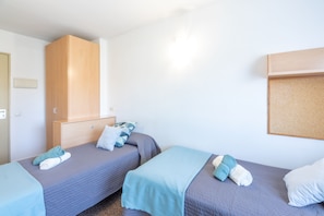 Quadruple Room, 2 Bedrooms | Desk, laptop workspace, iron/ironing board, free WiFi