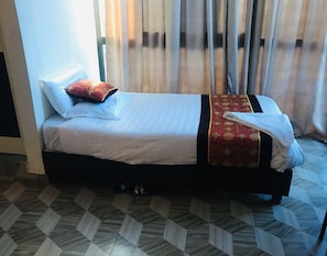 Desk, laptop workspace, blackout curtains, free WiFi