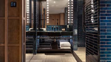 Designer toiletries, hair dryer, bathrobes, slippers
