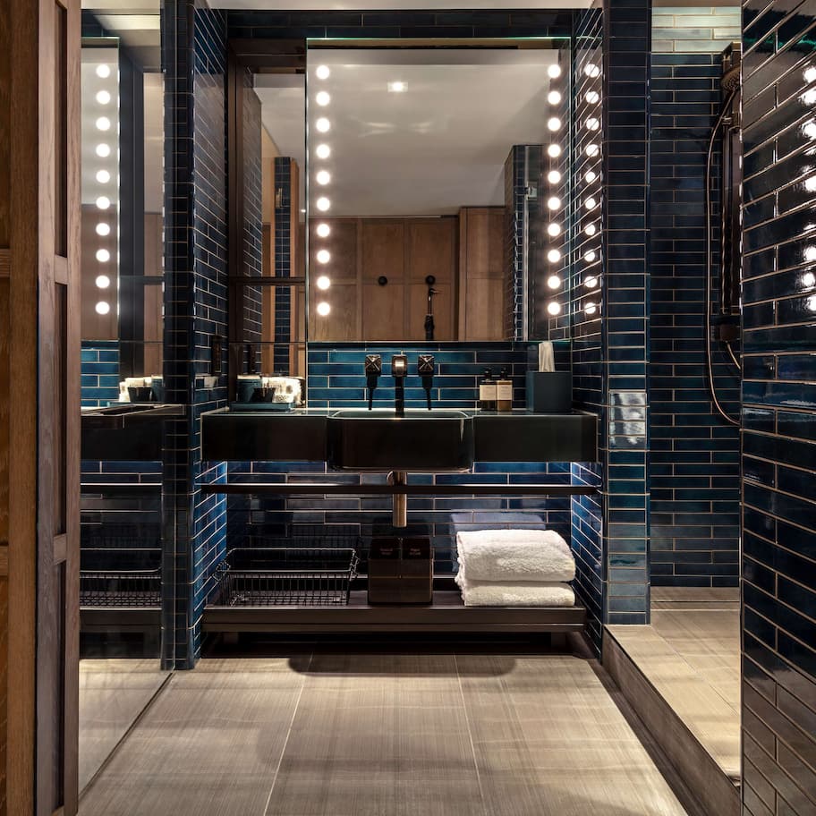 Designer toiletries, hair dryer, bathrobes, slippers