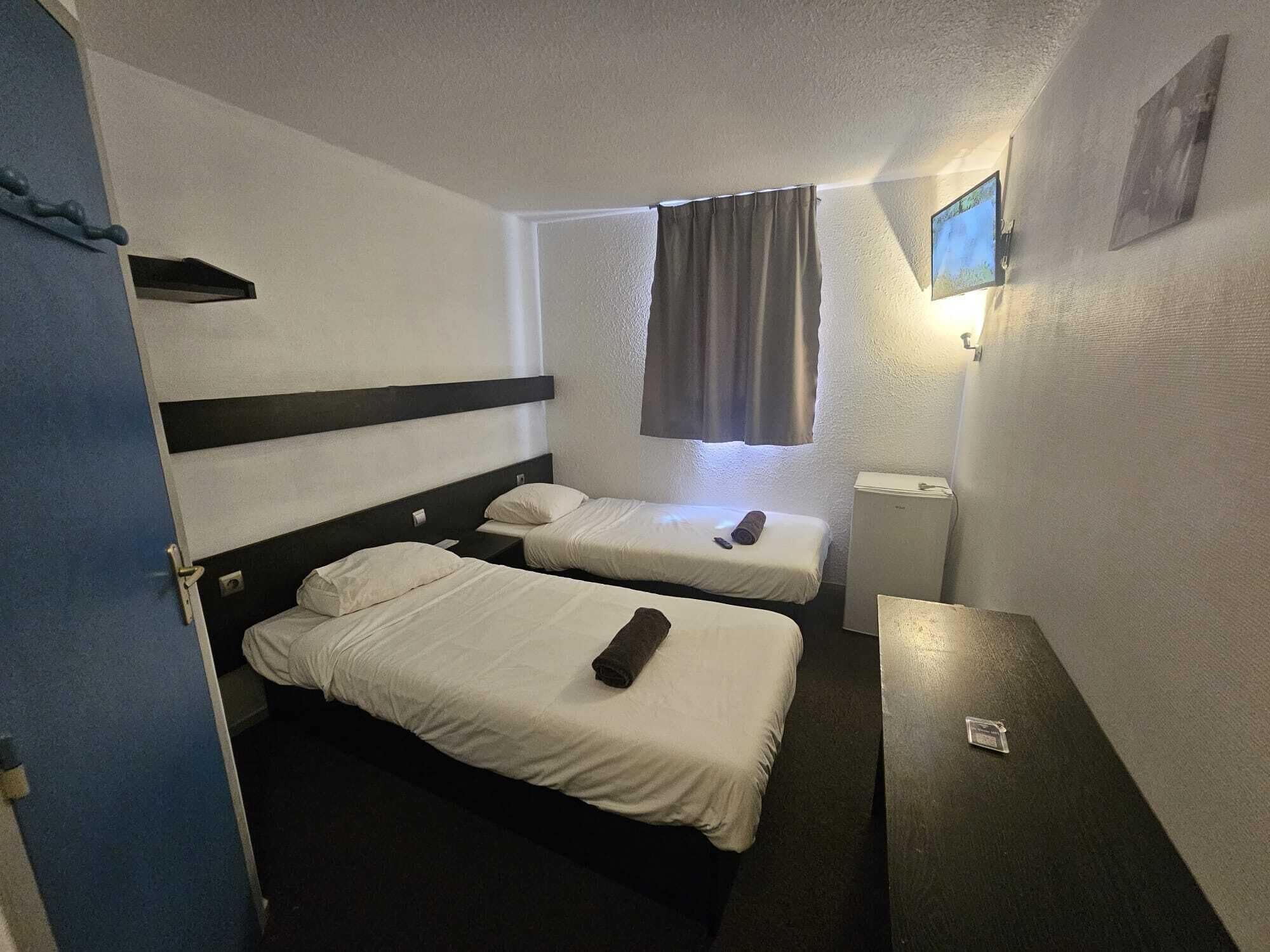 Klassieke Twin kamer | Verduisterende gordijnen, geluiddichte muren, gratis wifi, beddengoed