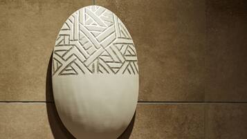 A textured wall with a geometric pattern.