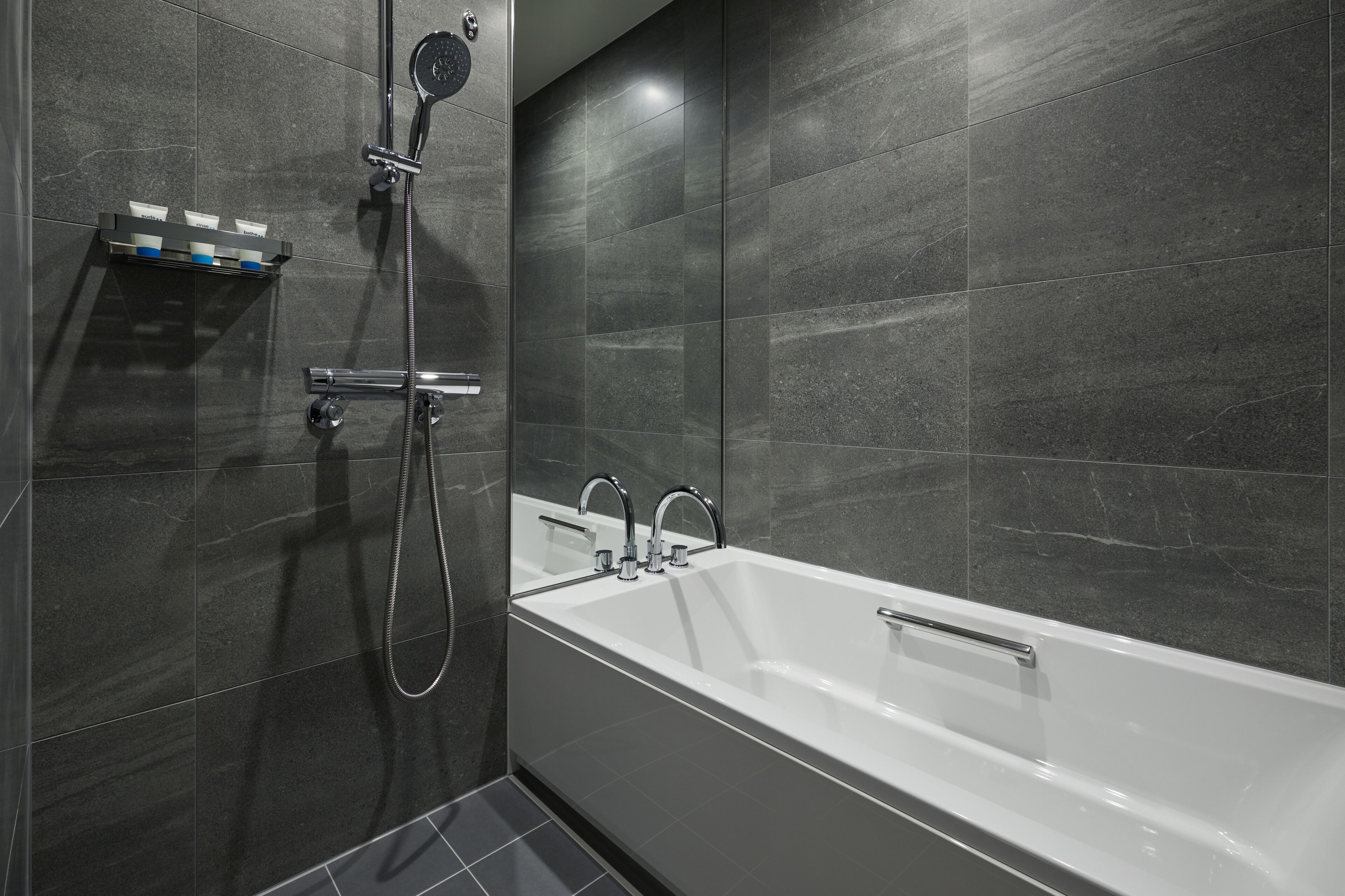 hair dryer, slippers, bidet, towels