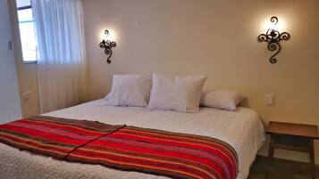 Hypo-allergenic bedding, down comforters, memory foam beds, in-room safe