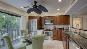 Condo, Multiple Beds (Our House at the Beach Lakeside) | Private kitchen | Oven, spices, paper towels, dining table - Our House at the Beach Lakeside (Siesta Key)