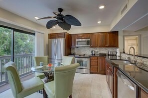 Condo, Multiple Beds (Our House at the Beach Lakeside) | Private kitchen | Oven, spices, paper towels, dining tables - Our House at the Beach Lakeside (Siesta Key)