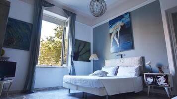 Hypo-allergenic bedding, down comforters, laptop workspace