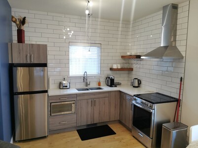 Lux Quarters Kitimat River Suite. Quiet neighborhood, Private yard.