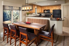 Enjoy meals in the kitchen with a dining area and central island.