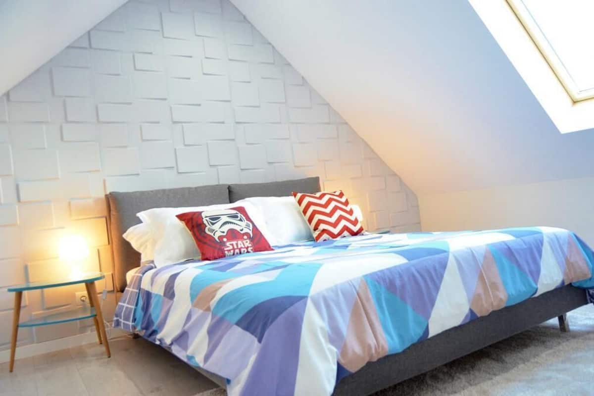 Premium bedding, down duvets, desk, laptop workspace