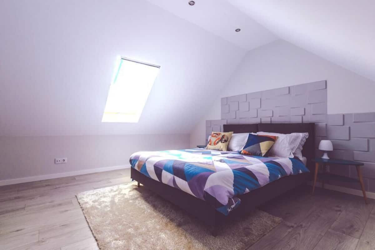 Premium bedding, down duvets, desk, laptop workspace