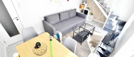 42-inch flat-screen TV with cable channels, TV, DVD player