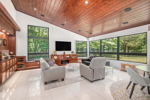Dunes Lodge is a newly restored mid-century modern home in Laketown, Michigan.