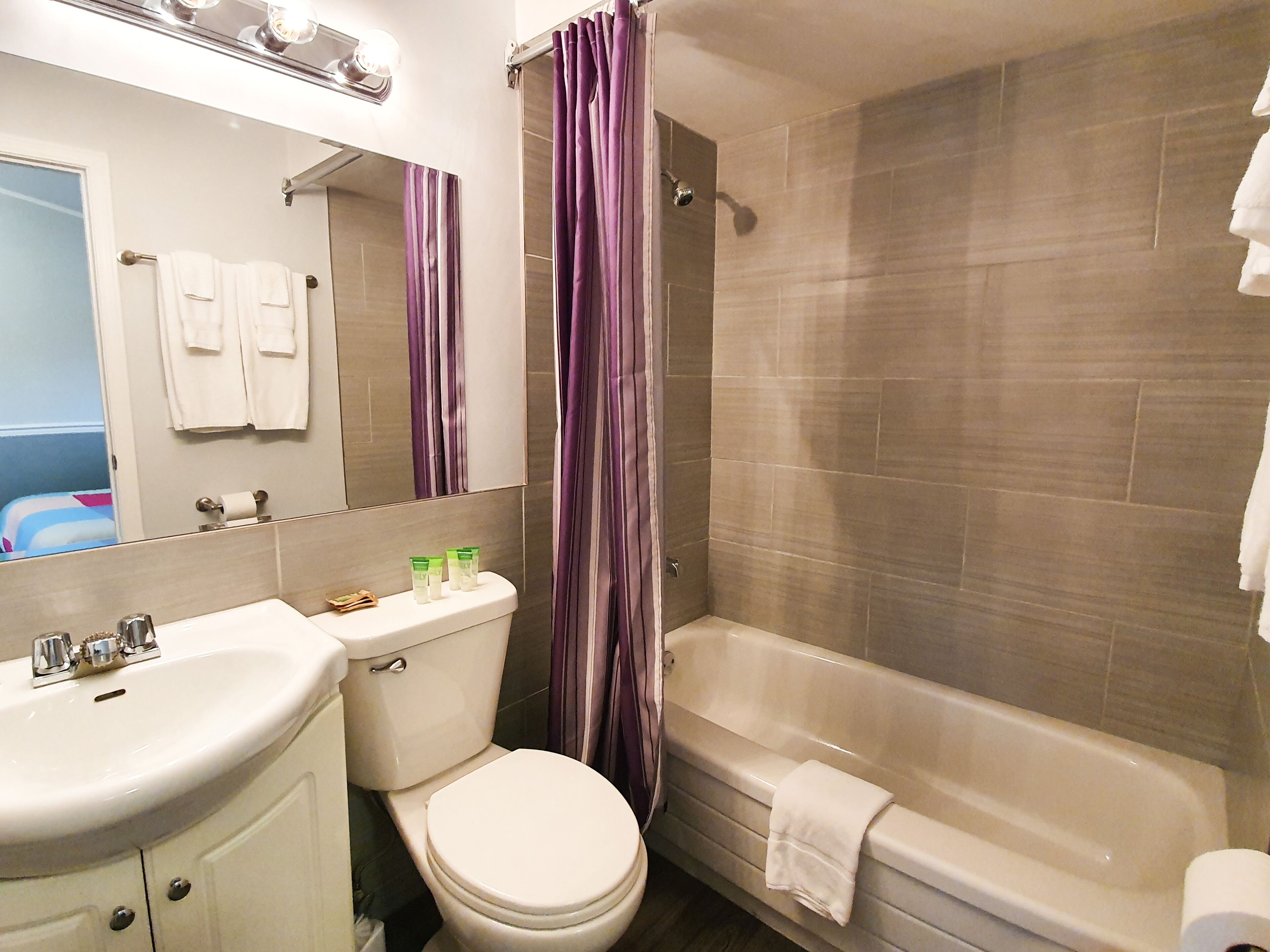 double room, 2 queen beds | bathroom | towels, soap, shampoo, toilet paper