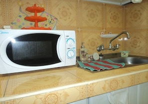 Chambre Triple Classique | Micro-ondes