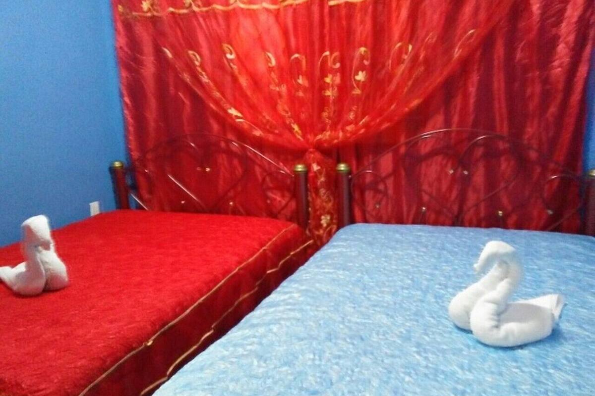 Chambre Deluxe double | Minibar, décor unique, ameublement unique, fer et planche à repasser