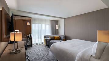 Premium bedding, pillow-top beds, desk, laptop workspace