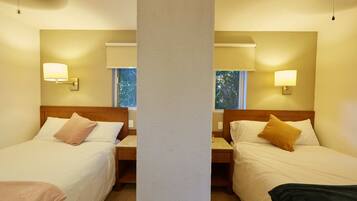 Individually furnished, desk, laptop workspace, iron/ironing board