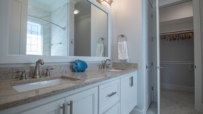 Combined shower/tub, hair dryer, towels, soap