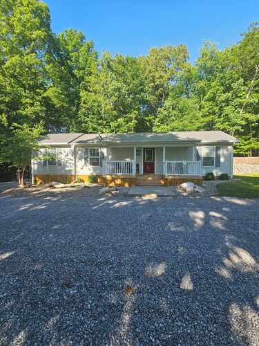 Lake House  with easy water access, limited water view, sitting on 4 acres.